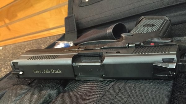 Presidential hopeful Jeb Bush tweeted the image of a gun engraved with his name.