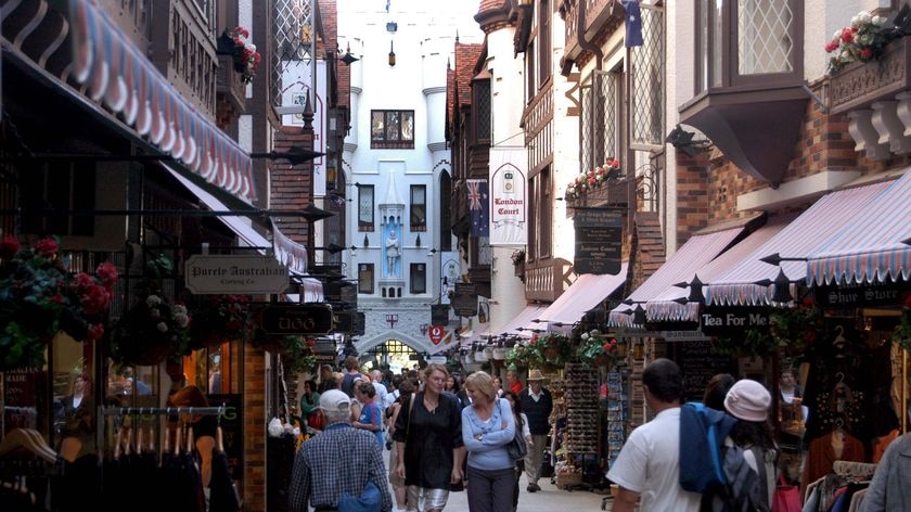 People make their way through London Court in Perth's CBD