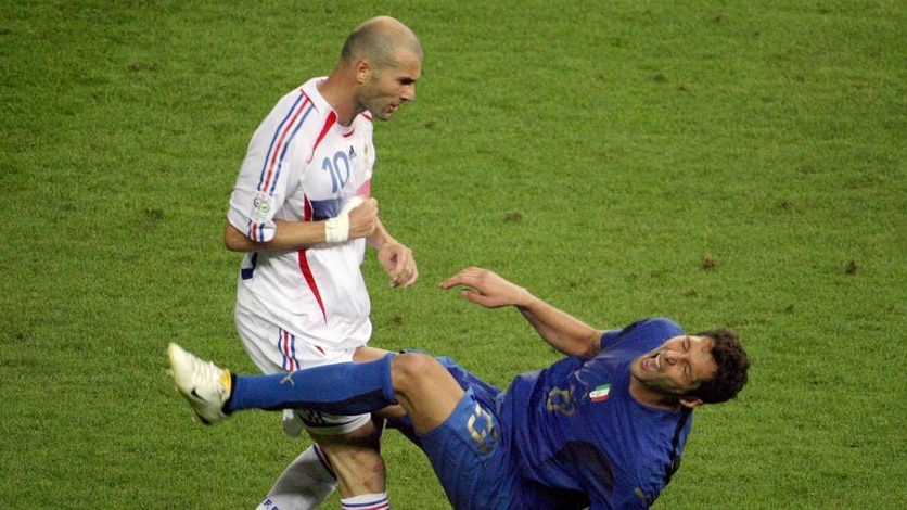 French midfielder Zinedine Zidane (L) head-butts Italian defender Marco Materazzi