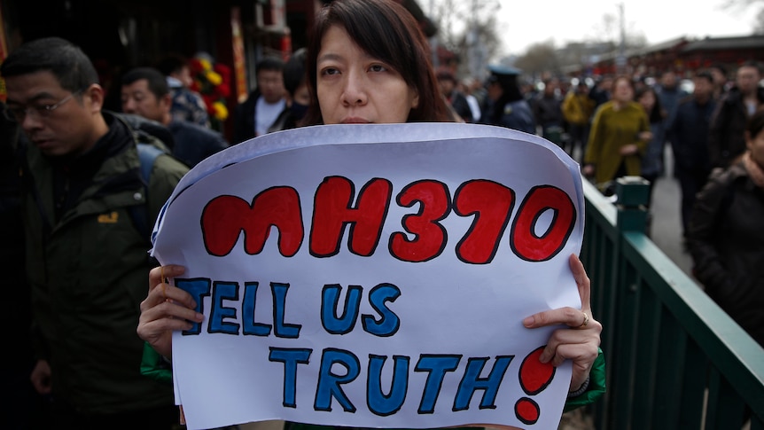 Families of passengers onboard missing flight MH370 remember one year on