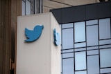The Twitter bird logo is seen at the company's headquarters in San Francisco, California.