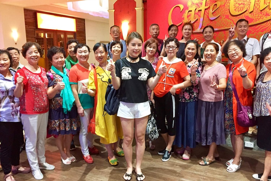 A group of Chinese tourists at the Cafe China restaurant in Cairns in 2017.