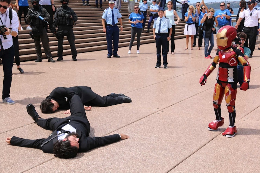 Iron Boy defeats two of Ultron's agents at the Sydney Opera House.