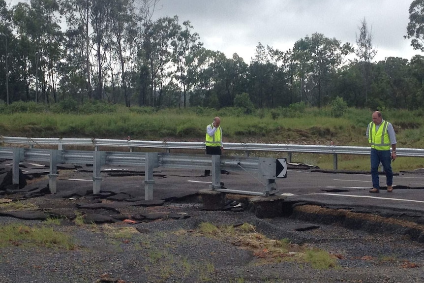Flood-damaged road crossing at Yeppoon, north of Rockhampton in central Queensland on March 27, 2014