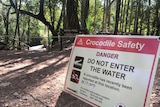 A sign warning of a crocodile sighting at the Berry Springs swimming hole, dated July 29, 2017.