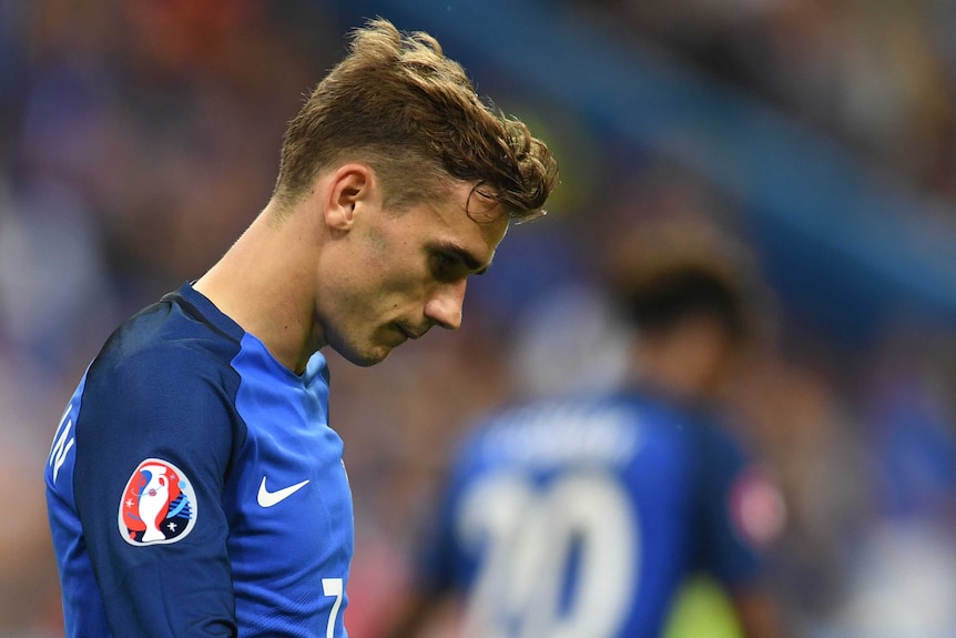 France's forward Antoine Griezmann looks dejected