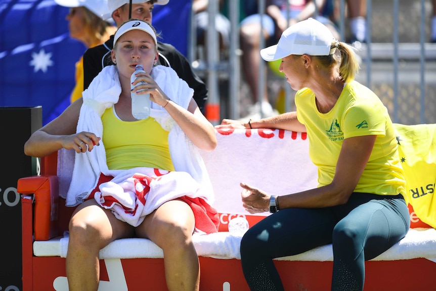 Daria Gavrilova and Alicia Molik at the Fed Cup