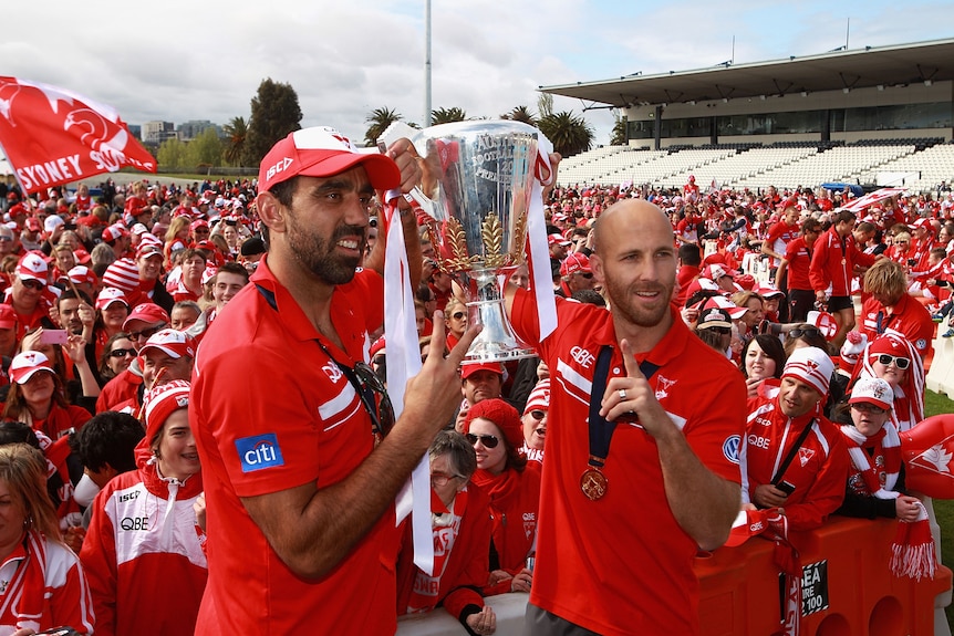 Adam Goodes and Jarrad McVeigh with the Premiership Cup