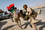 Libyan forces retreat from Bani Walid