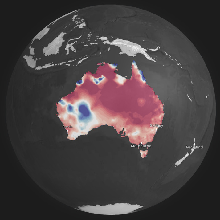 A globe centred on Australia, showing rainfall patterns for August. Most of the map is red except for the south-west