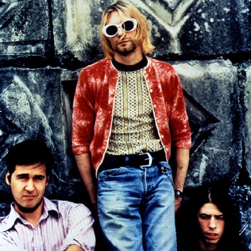 Undated photo of Nirvana band members Kurt Cobain (c), Kris Novoselic (L) and David Grohl (R).