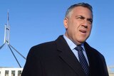 Treasurer Joe Hockey speaks to the media outside Parliament House after delivering his first budget.
