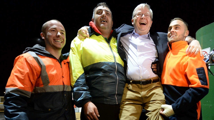 Forklift drivers at Flemington Markets give Prime Minister Kevin Rudd a lift