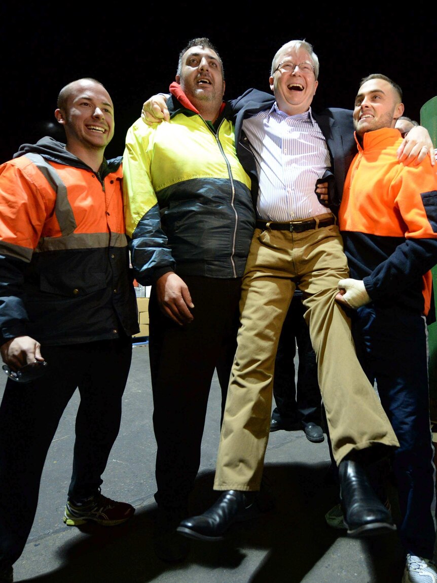 Forklift drivers at Flemington Markets give Prime Minister Kevin Rudd a lift