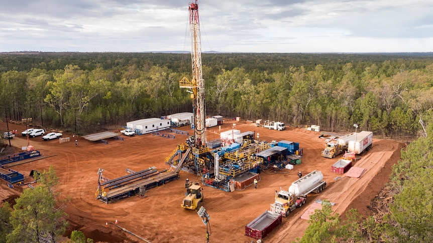 A drilling rig in a clearing 