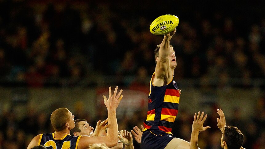 The Crows and Magpies pushed themselves to the limit at Football Park.
