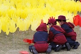 Students plant hands at the Barangaroo Sea Of Hands exhibition