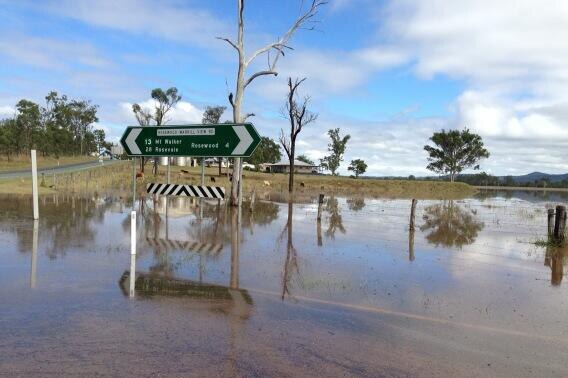 Water over road at Rosewood, west of Ipswich in south-east Queensland