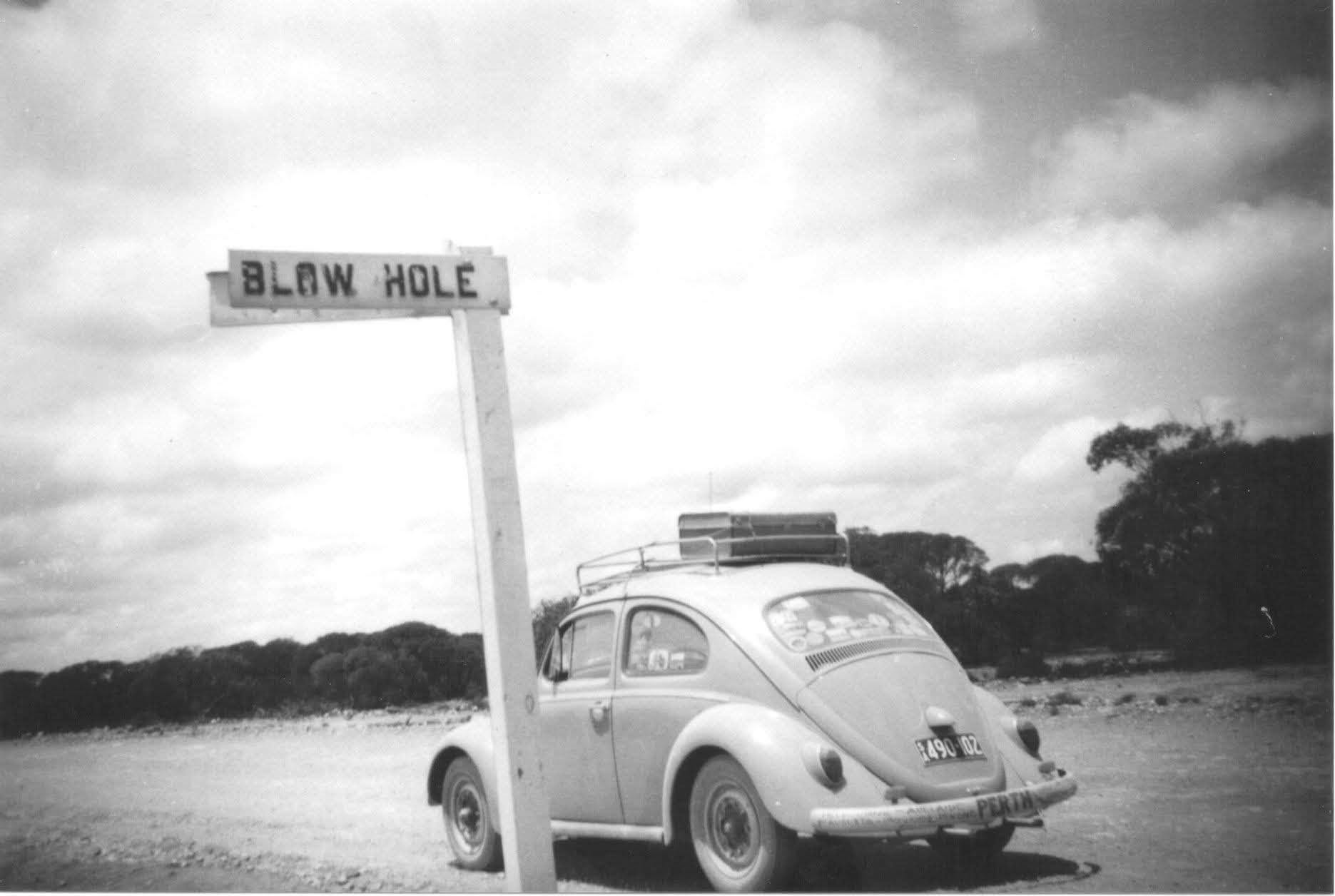 black and white photo of beetle on the Eyre Highway in 1964