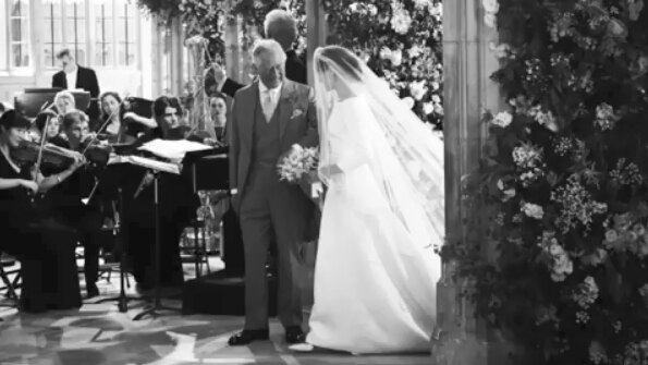 Meghan Markle and Prince Charles at her wedding to Prince Harry.