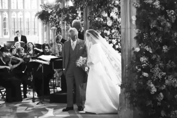 Meghan Markle and Prince Charles at her wedding to Prince Harry.