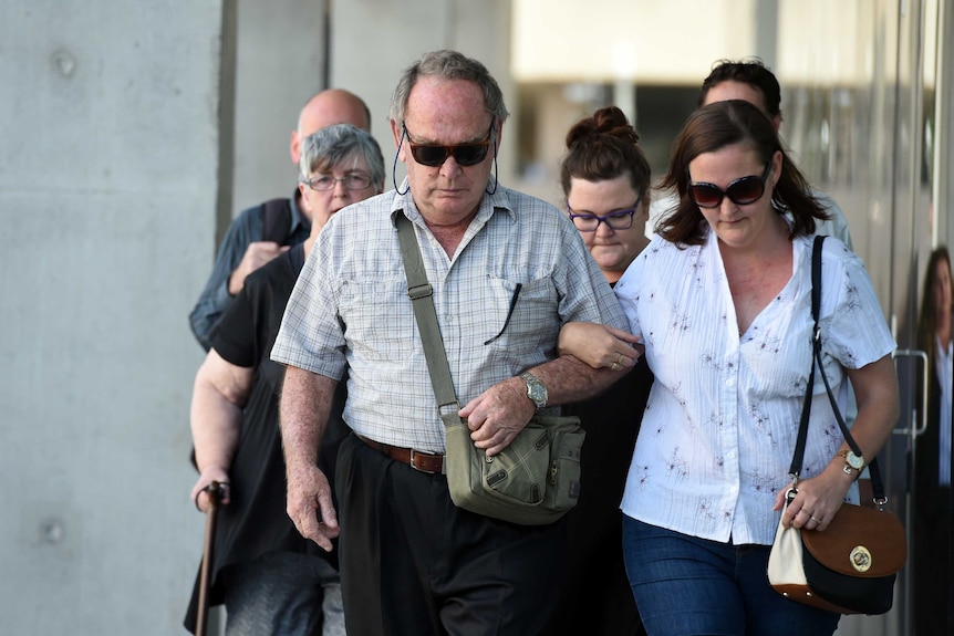 Graham Ogden (left), brother of Barbara McCulkin, and family members leave the Supreme Court in Brisbane, Monday, Nov. 28, 2016