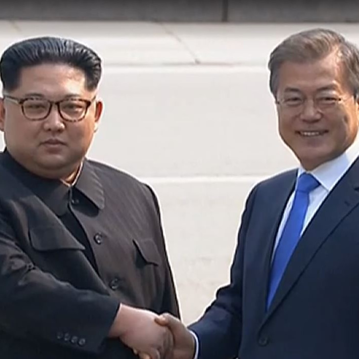 Kim Jong-un walks across border into South Korea.
