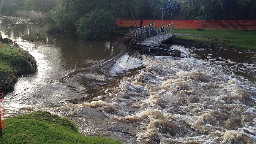 A footbridge is washed away at Strathalbyn