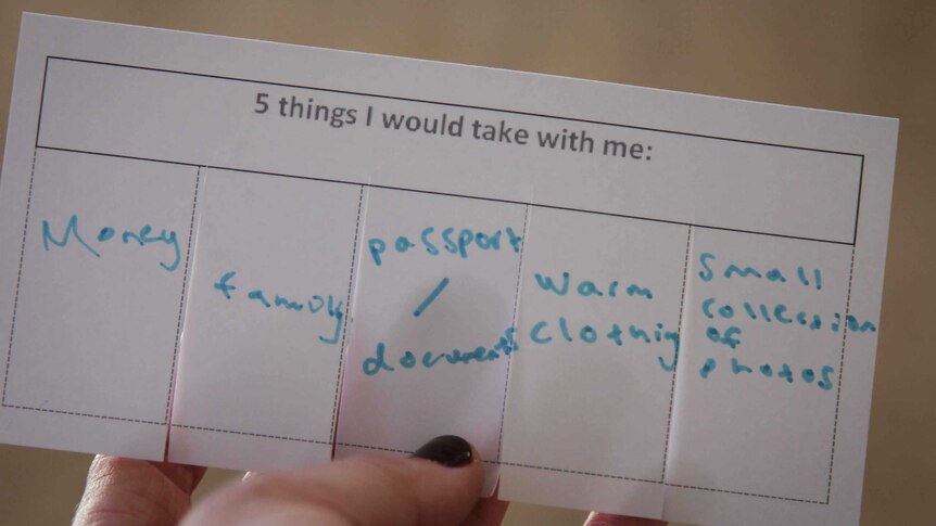 A piece of paper with five boxes for participants to write the five things they'd take with them in fleeing their home.