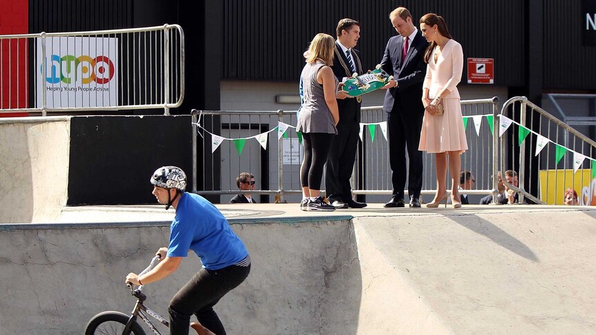 City of Playford Mayor, Mr Glenn Docherty, presents a skateboard to the Duke and Duchess of Cambridge.