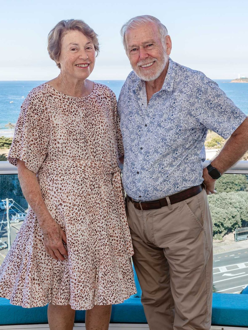 Great-grandparents Keith and Glenda Drake standing on the balcony of their Maroochydore penthouse.