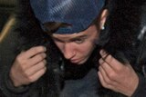 Pop singer Justin Bieber arrives at a police station in Toronto on January 29, 2014