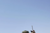 Libyan rebels take cover