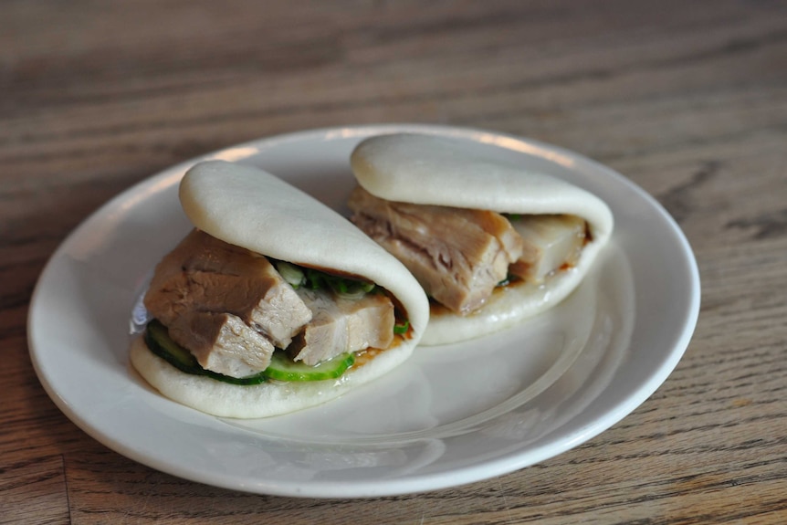 Two pork buns on a plate