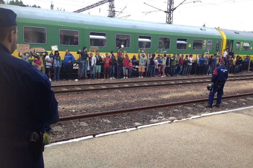 A train crowded with asylum seekers at Bicske