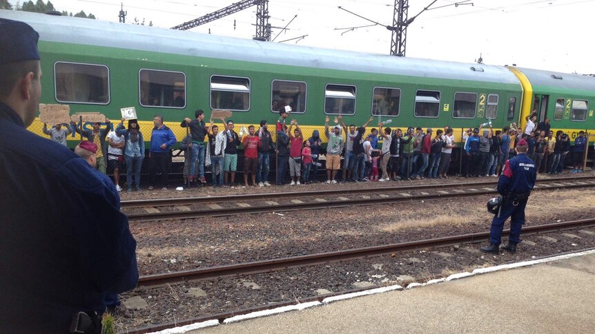 A train crowded with asylum seekers at Bicske