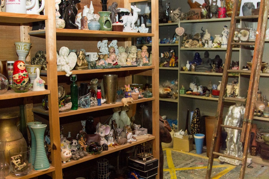 Hundreds of ornaments sit on shelves.