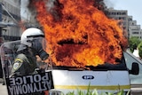 Van set on fire during May Day protests