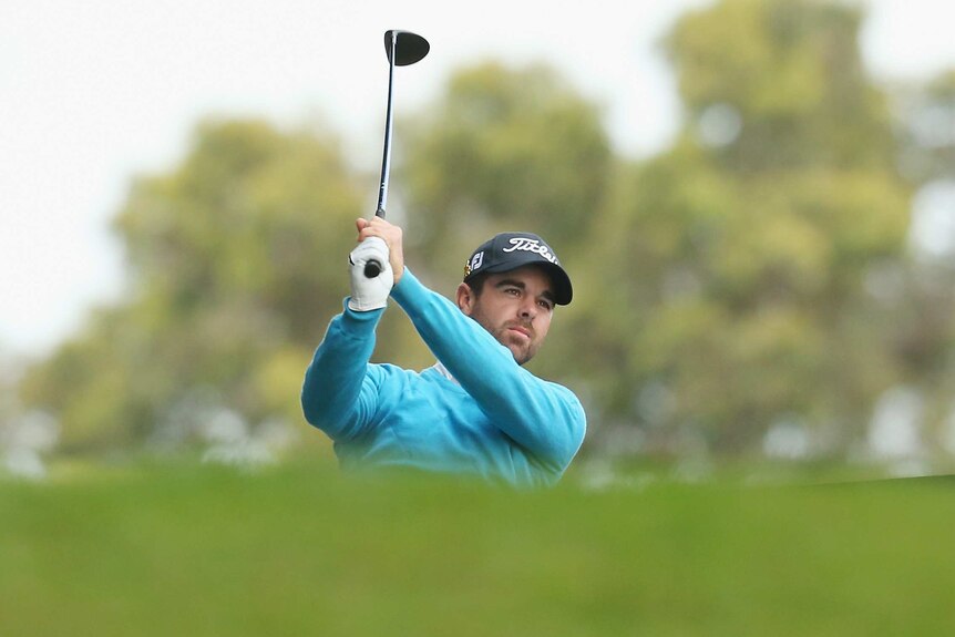 Nick Cullen plays a shot at Royal Melbourne