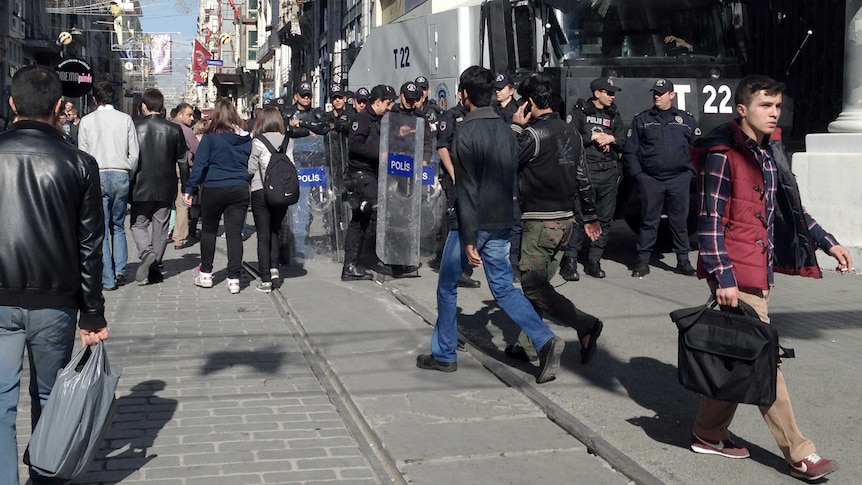 Uniformed police stand guard in Istiklal Street Istanbul.