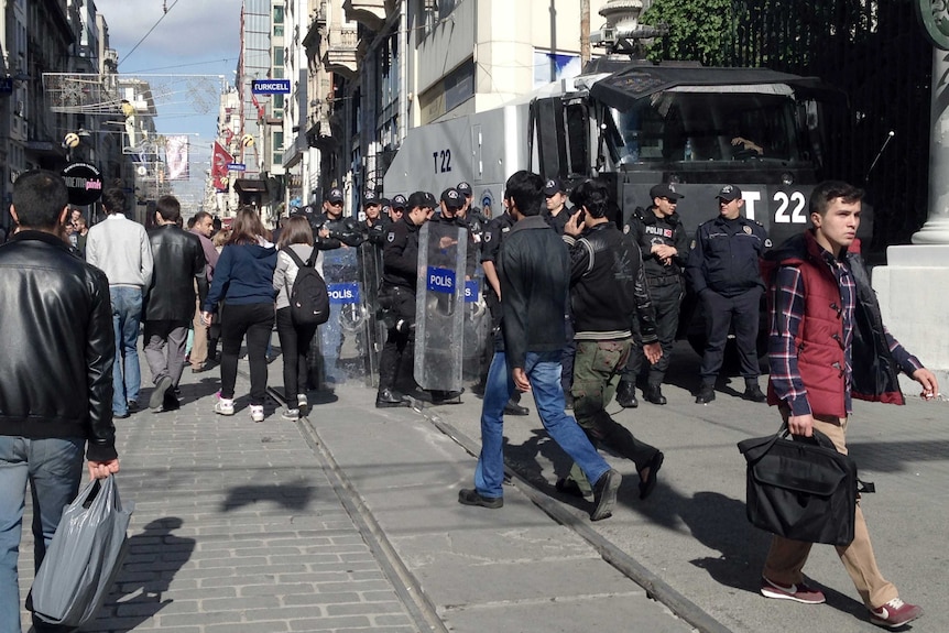 Uniformed police stand guard in Istiklal Street Istanbul.