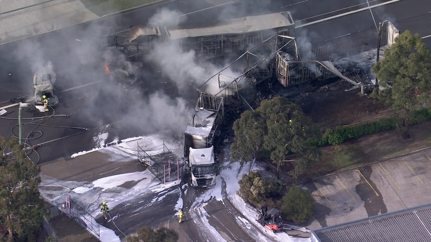 smoke billows from crash site