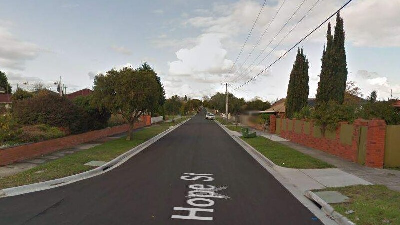 A Google Maps street-view image of Hope Street shows a residential street lined with brick houses.