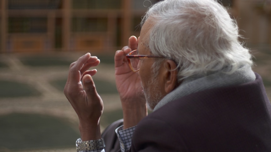 A man prays.