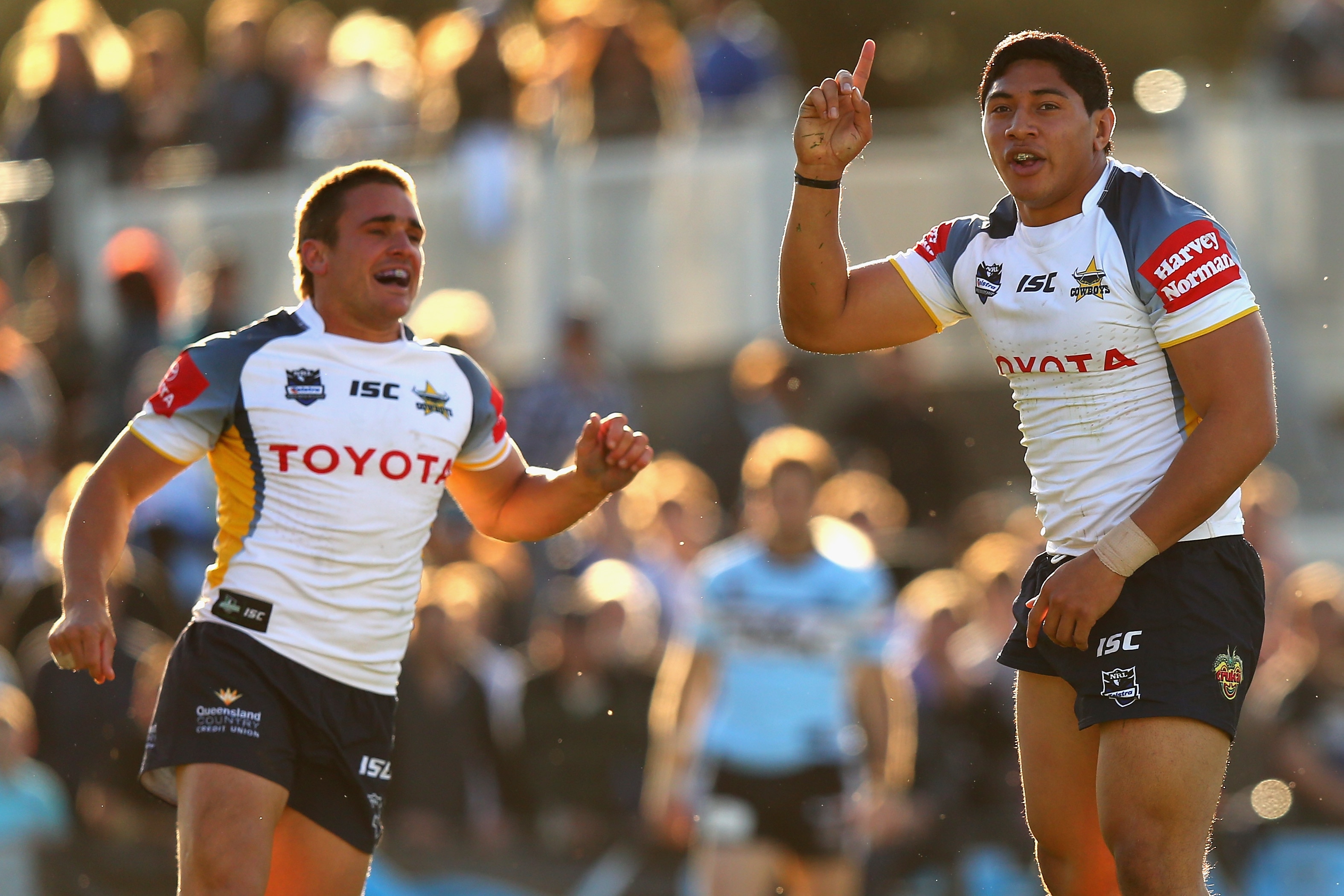 Taumalolo celebrates a try during a rugby league match.
