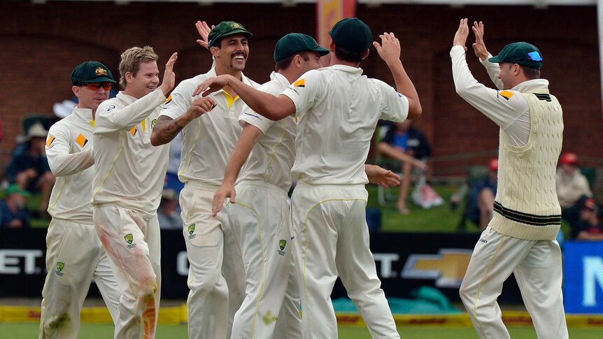 Australia celebrate a Steve Smith wicket