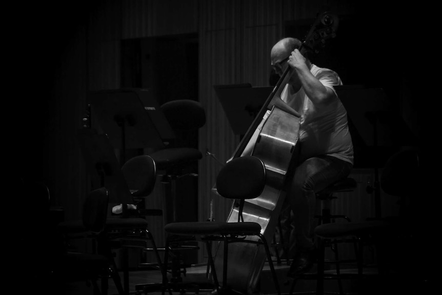 A cellist rehearses at the Sydney Opera House