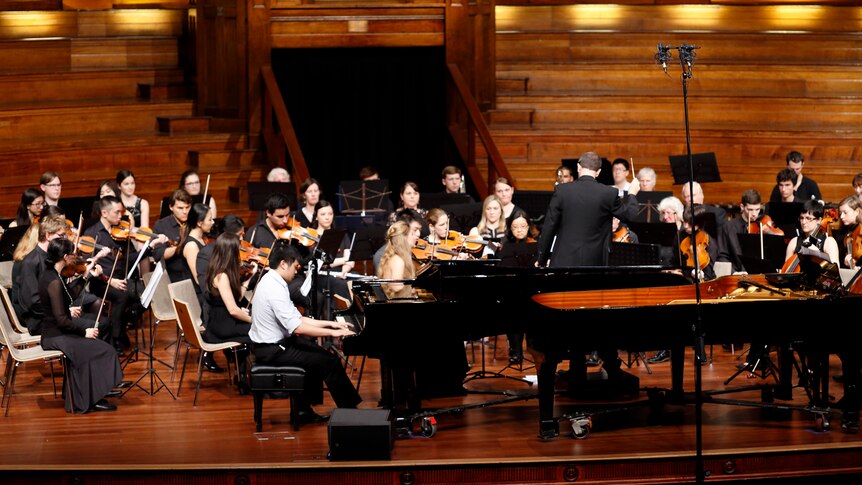 An image of the Queensland Medical Orchestra on stage