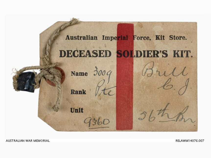 Paper tag with text 'Deceased Soldier's Kit'
