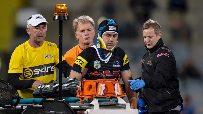 Jamie Soward leaves the field after a hit from Jack Wighton